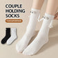 Holding Feet Not Holding Hands Couple Socks