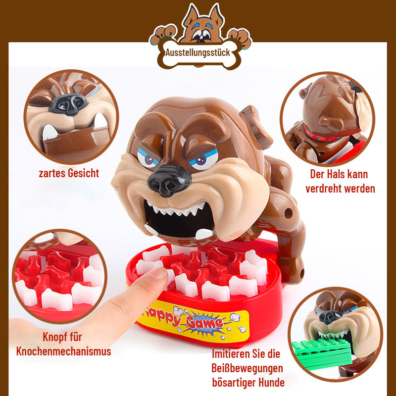 Tischspielzeug: Hund beißt Finger