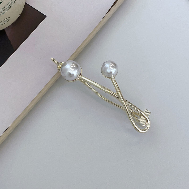 Two Pearl Twist Clips