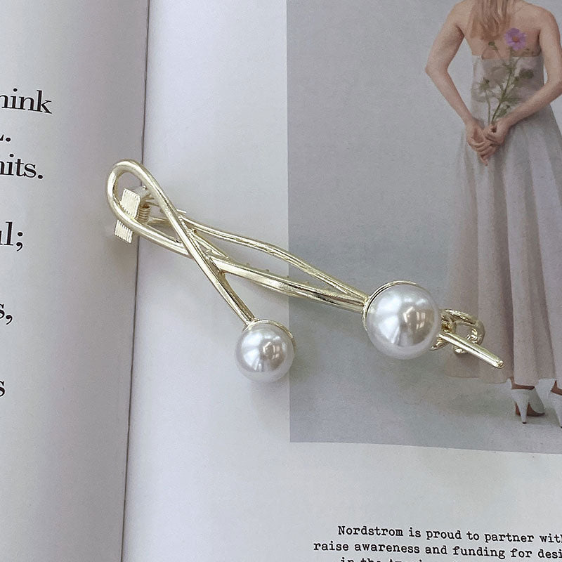 Two Pearl Twist Clips