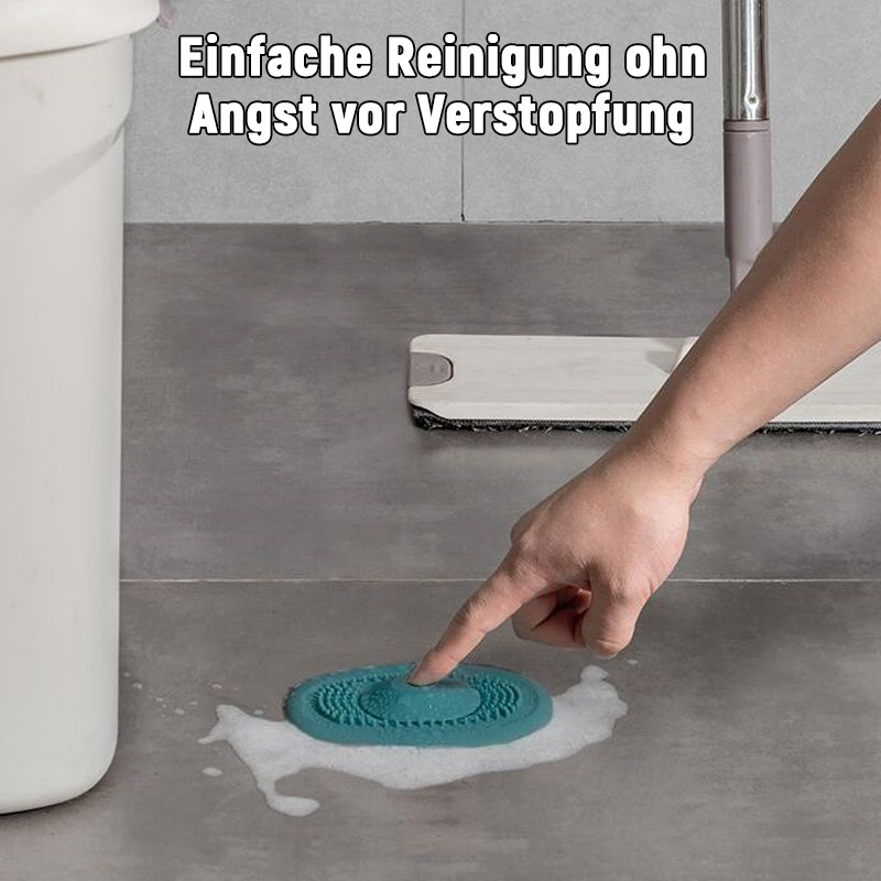 Geruchssicherer Leckstopfen mit Druckverschluss/Press the floor drain to prevent clogging