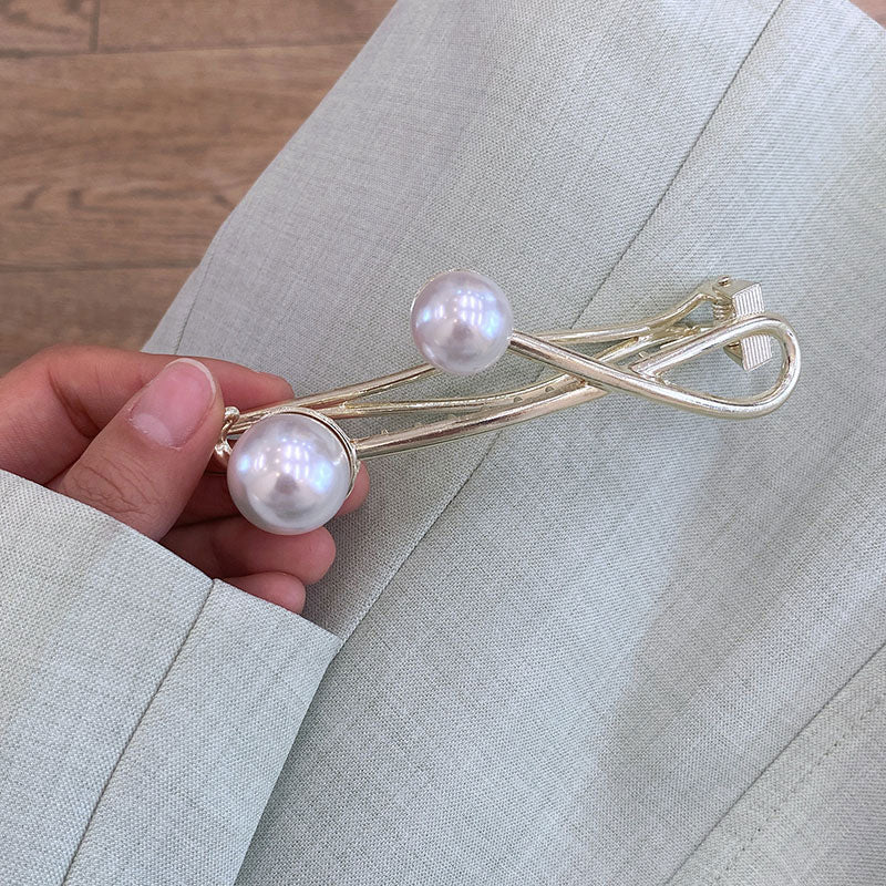 Two Pearl Twist Clips