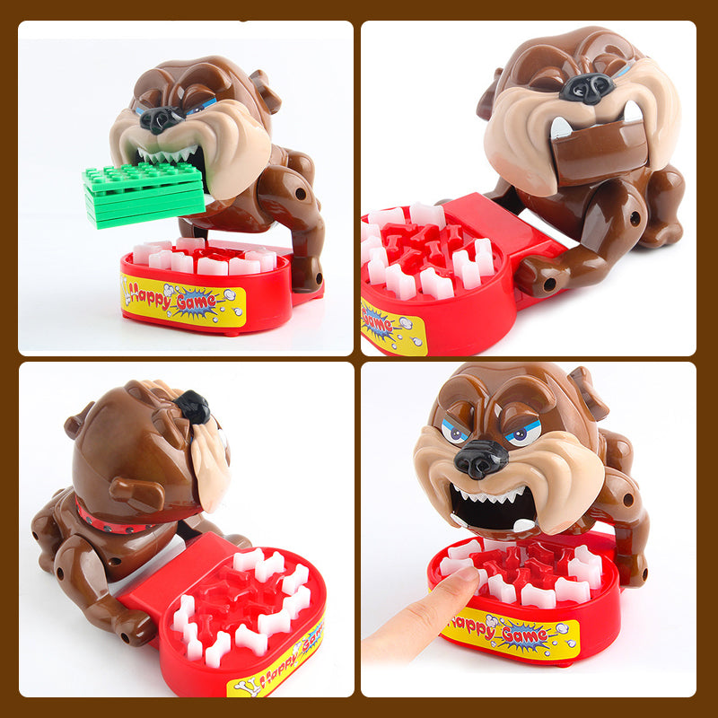 Tischspielzeug: Hund beißt Finger