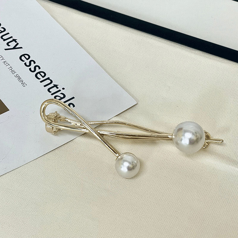 Two Pearl Twist Clips