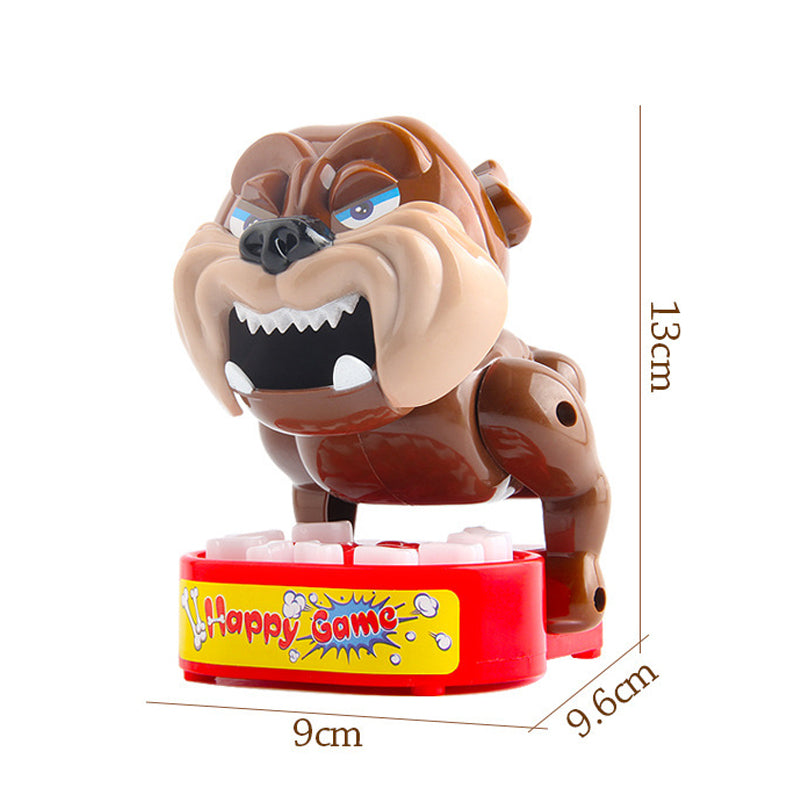 Tischspielzeug: Hund beißt Finger