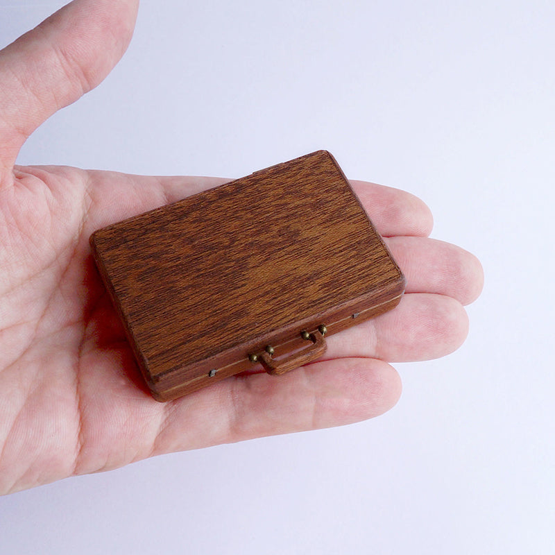 Collection of stones in a suitcase